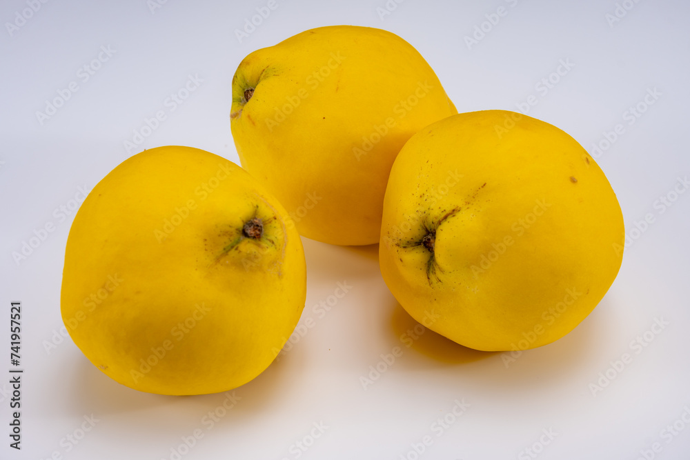 Group of ripe yellow quince apples close up