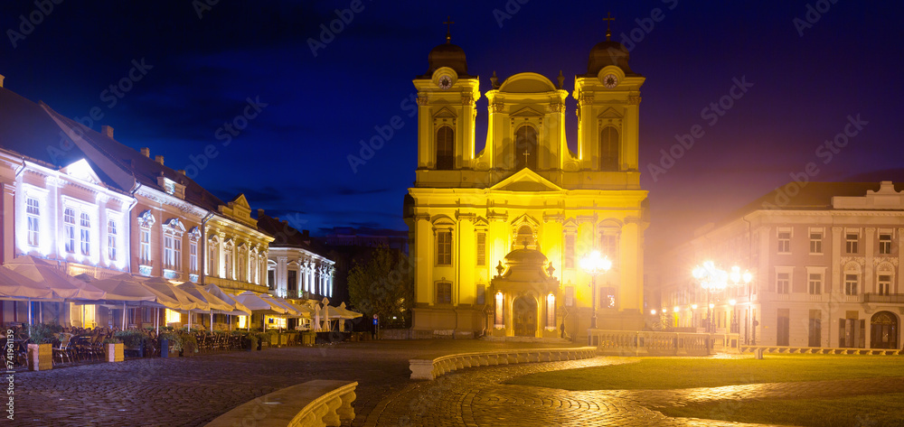 Night view of St.George Roman Catholic Dome on Unirii Square, Timisoara, Romania