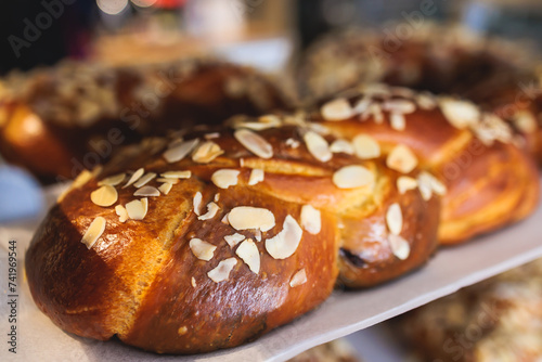 Tsoureki, Traditional Greek Easter Bread, greek freshly baked cake in Athens, Greece, with almond, mastiha, mahleb and cinnamon, orthodox Easter in Greece, sweet bread with red eggs