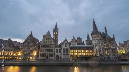 Ghent Belgium time lapse, city skyline day to night at St Michael's Bridge (Sint-Michielsbrug) with Leie River and Korenlei photo