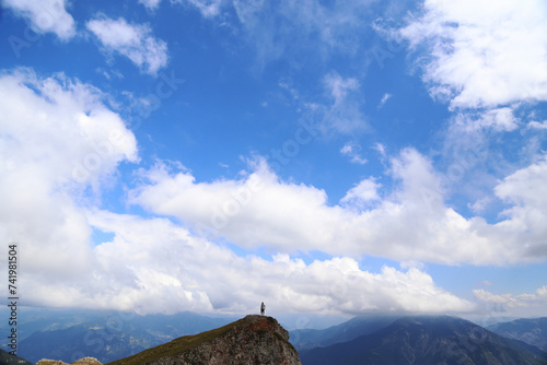 person on the top of the mountain