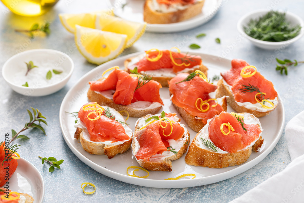 Smoked salmon crostini with cream cheese, dill and lemon zest