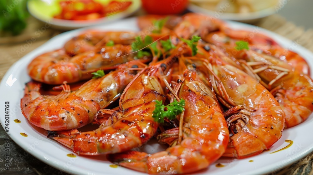delicious shrimp on plate close up on colourfull background.shrimps with spices ,fried shrimps , prawns with sauce, Grilled tiger shrimps ,Grilled seafood, delicious shrimp on plate close up on colourfull background.shrimps with spices ,fried shrimps , prawns with sauce, Grilled tiger shrimps ,Grilled seafood,