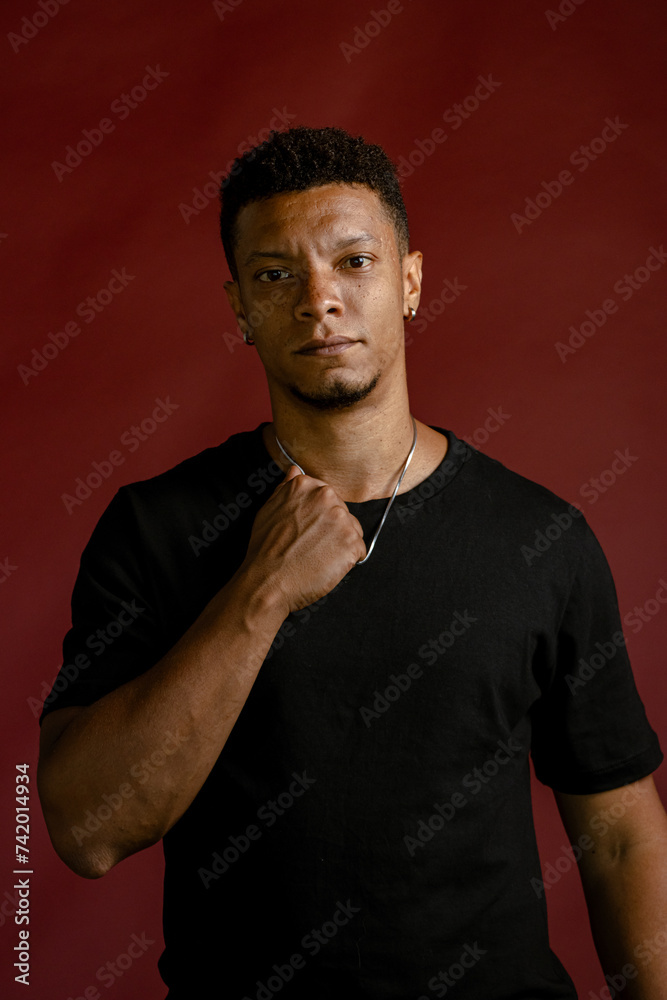 Portrait young African man looking defiant