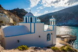 Traditional white church on sea coast in Firopotamos village, Milos island, Cyclades, Greece