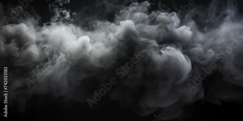 Black smoke exploding outwards with empty center. Dramatic smoke or fog effect