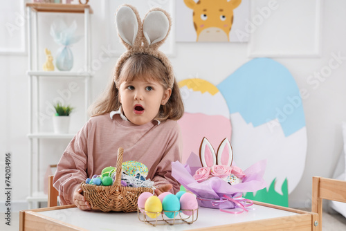 Shocked little girl wearing...