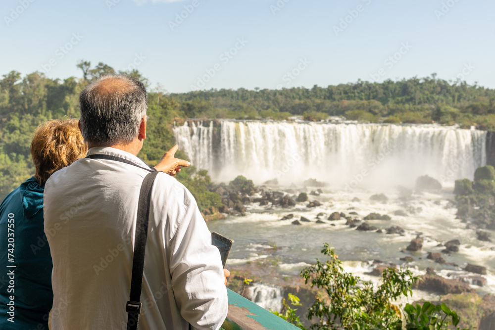 family enjoying iguazu falls