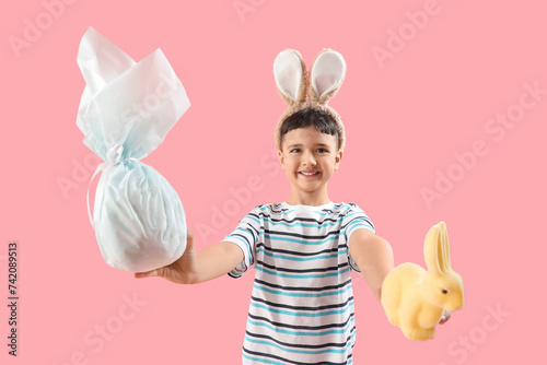Cute little boy wearing bun...