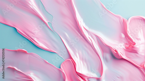 Abstract gooey pink paint on blue background. Slime or bubble gum texture. 