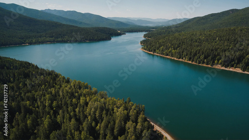 Aerial view of the lake surrounded by hills