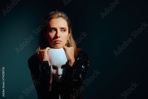 Canvas-taulu Sad Woman Holding a Theater Mask Feeling Depressed