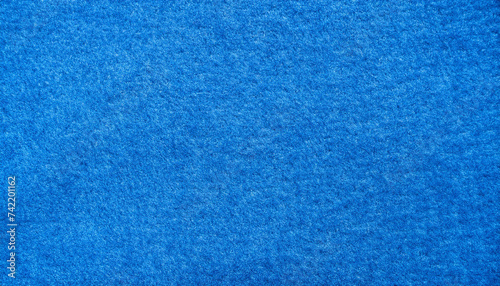 blue felt fabric texture as background. melange fuzzy woolen cloth textured; close up of textile surface