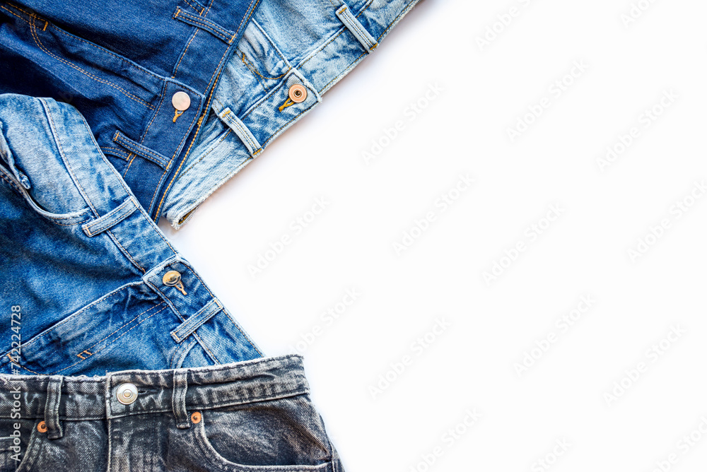 Various shades and colors of denim fabrics. Denim texture background. Copy space.