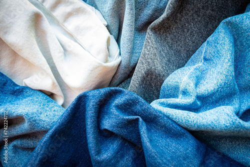 Obraz na płótnie Various shades and colors of denim fabrics. Denim texture background. w salonie