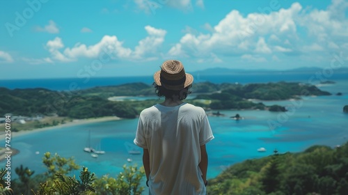 Man Overlooking Tropical Ocean View