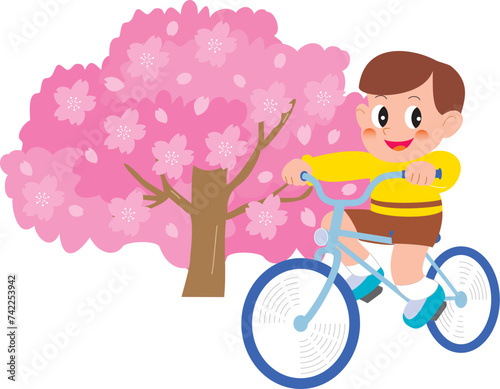 桜と自転車に乗る男の子
