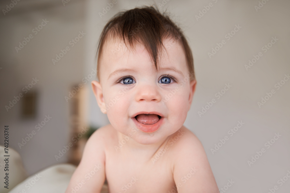 Happy, cute and portrait of baby in nursery playing for child development in living room at home. Sweet, adorable and young infant, toddler or kid learning sitting in bedroom in modern house. Happy, cute and portrait of baby in nursery playing for child development in living room at home. Sweet, adorable and young infant, toddler or kid learning sitting in bedroom in modern house.