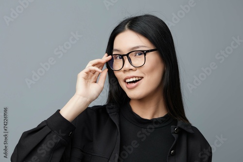 Asian woman beautiful fashion background studio portrait smile glasses