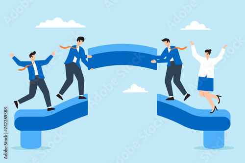 Business team building bridge to connect path together