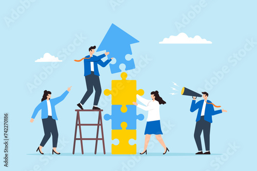 Business team connecting arrow jigsaw puzzle pieces together