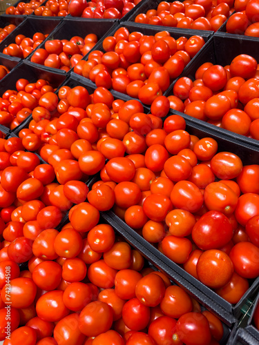 Ripe tomatoes on the counter in the market