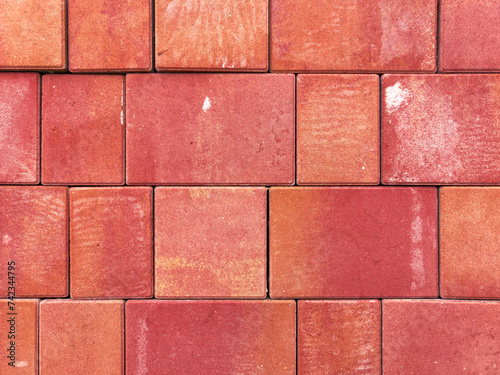 Red paving slabs as an abstract background. Texture