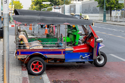 Canvas Print Colorful Tuk Tuks in parking lot, A mode of common public transportation in Bangkok, Thailand