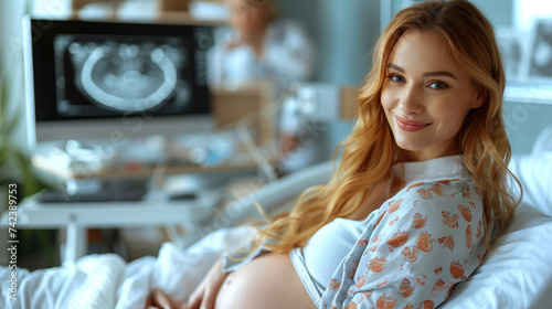 A pregnant woman in a hospital bed with the background a computer screen of an Ultrasound Sonogram Procedure to a Pregnant Woman. future Mother