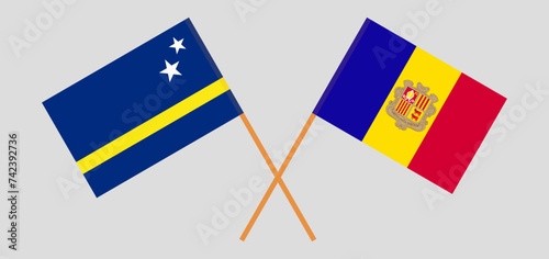 Crossed flags of Country of Curacao and Andorra. Official colors. Correct proportion