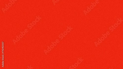Grainy background. Textured plain Scarlet Red color with noise surface. for display product background.