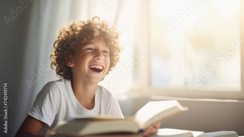 Cute child Reading a Book at Home. Education concept.