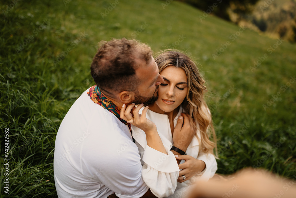 Young lovers dreaming with their eyes closed to their deep love. Couple model, concept photo shoot Young lovers dreaming with their eyes closed to their deep love. Couple model, concept photo shoot