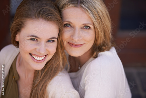 Loving, family and portrait mother and daughter smiling for happy, joyful and relax on vacation. Women, face and affectionate in relationship, security and bonding in America at home for connection