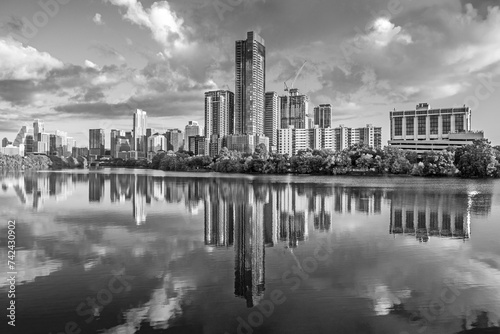 skyline of Austin with reflection in river in early morning,