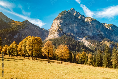 Alpine autumn or indian summer landscape shot at Grosser Ahornboden, large maple grove, Hinterriss, Schwaz, Tyrol, Austria photo