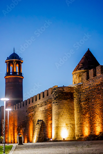Erzurum Kalesi . Translate : Castle of Erzurum. An evocative evening shot of the historical Erzurum Castle in Turkey photo