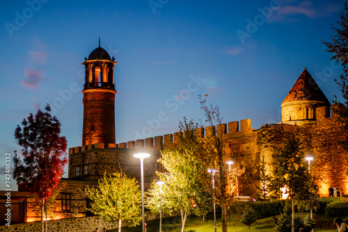 Erzurum Kalesi . Translate : Castle of Erzurum. An evocative evening shot of the historical Erzurum Castle in Turkey photo