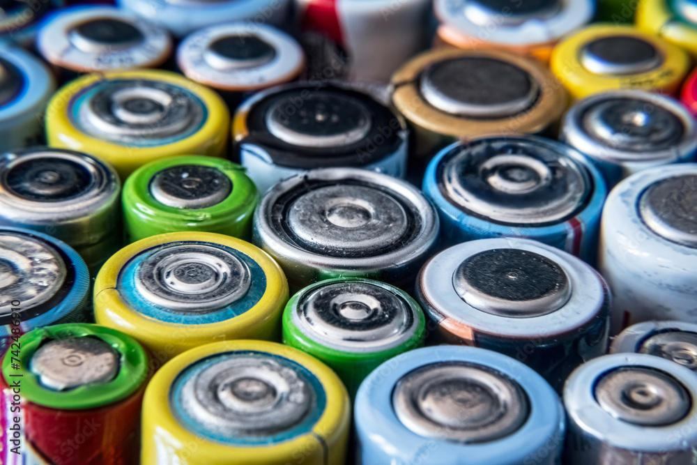 Group of used disposable drain batteries of various size Group of used disposable drain batteries of various size