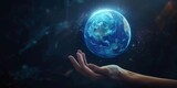 Hand interacting with a blue earth hologram dark ambiance Modern tech international business link