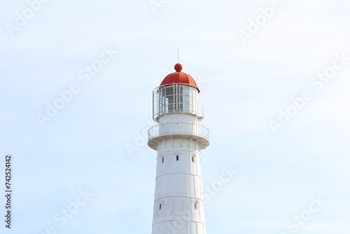 White lighthouse with summer sky