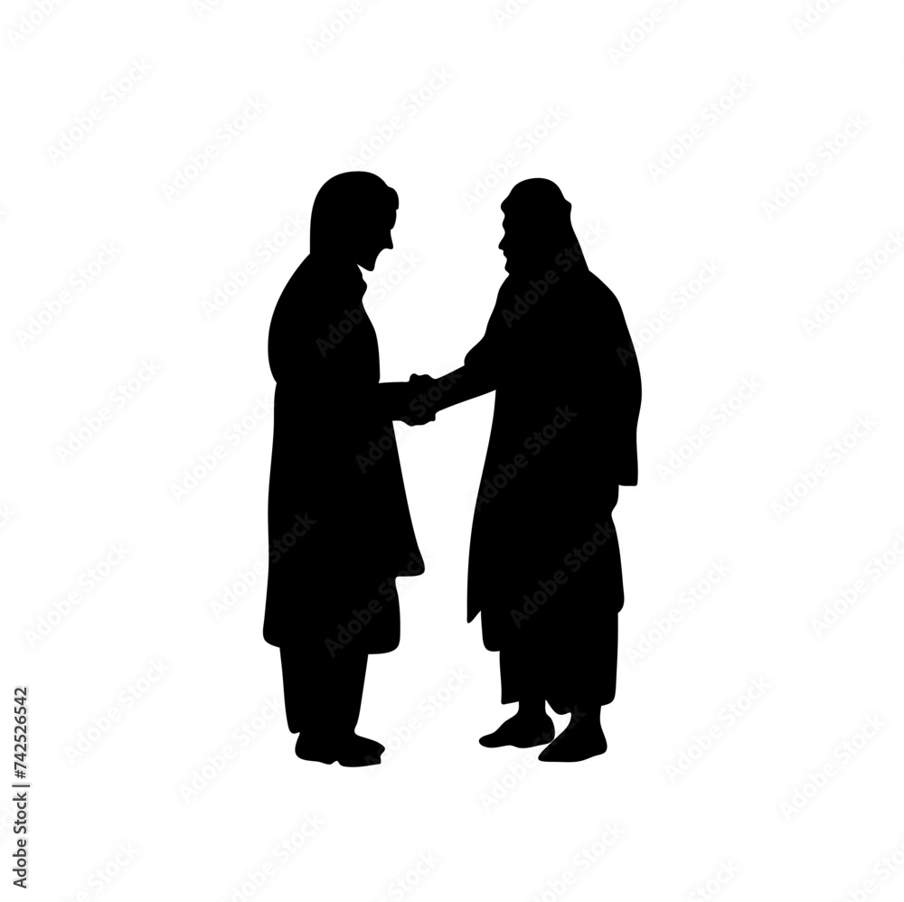 silhouettes of Muslim people shaking hands