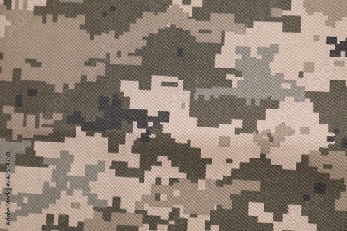 Texture of camouflage fabric as background  top view