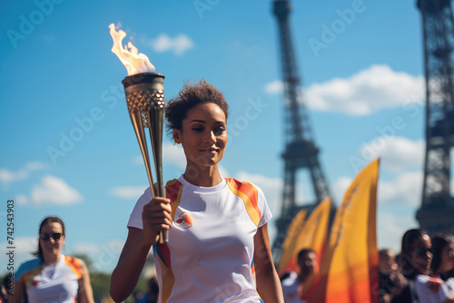 Young woman carrying Olympic torch with fire in Paris, France, 2024 Olympic games in France concept