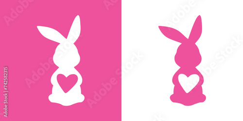 Logo con silueta de Conejo de Pascua con corazón. Silueta de Conejito de Pascua de pie