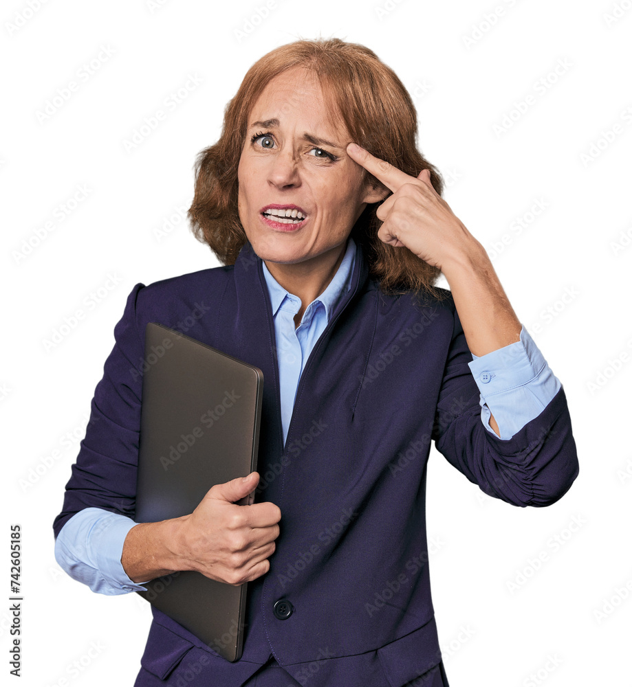 Mid-aged Caucasian with laptop in studio showing a disappointment gesture with forefinger. Mid-aged Caucasian with laptop in studio showing a disappointment gesture with forefinger.