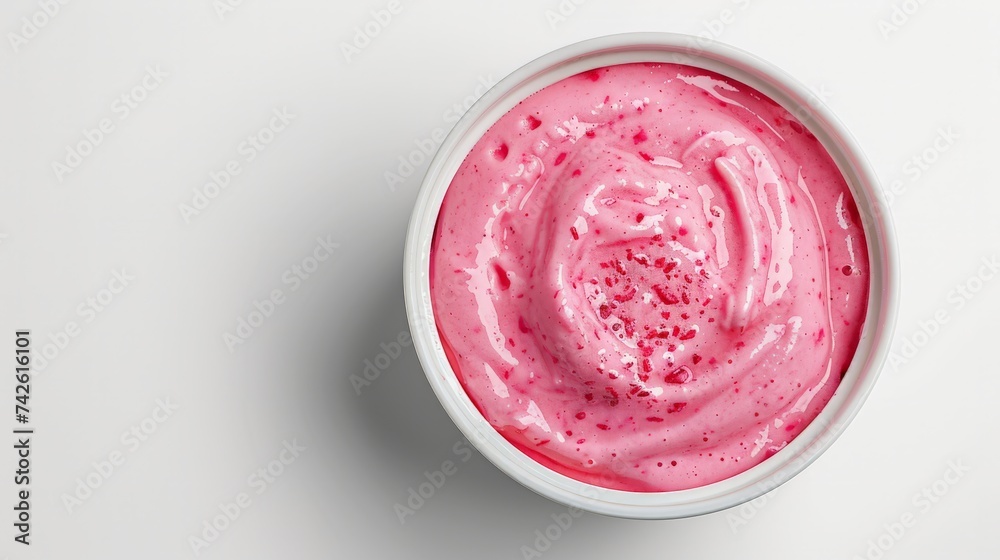 Bowl of strawberry yogurt isolated on white background from top view Bowl of strawberry yogurt isolated on white background from top view