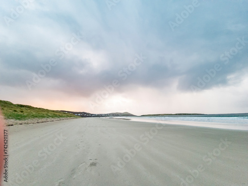 Dramatic clouds above Narin Strand, a beautiful large blue flag beach in Portnoo, County Donegal - Ireland.