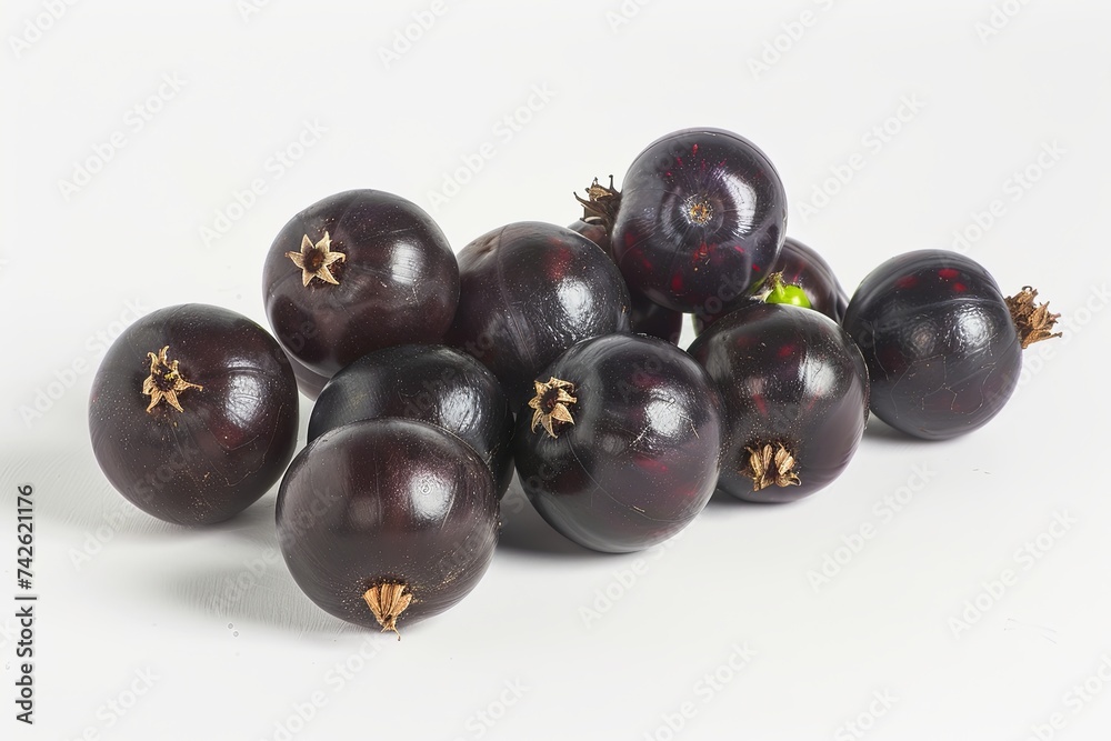 Black currant isolated on a pristine white background. Black currant isolated on a pristine white background.
