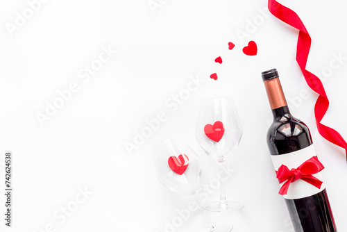 Bottle of red wine for Valentines Day celebration, top view